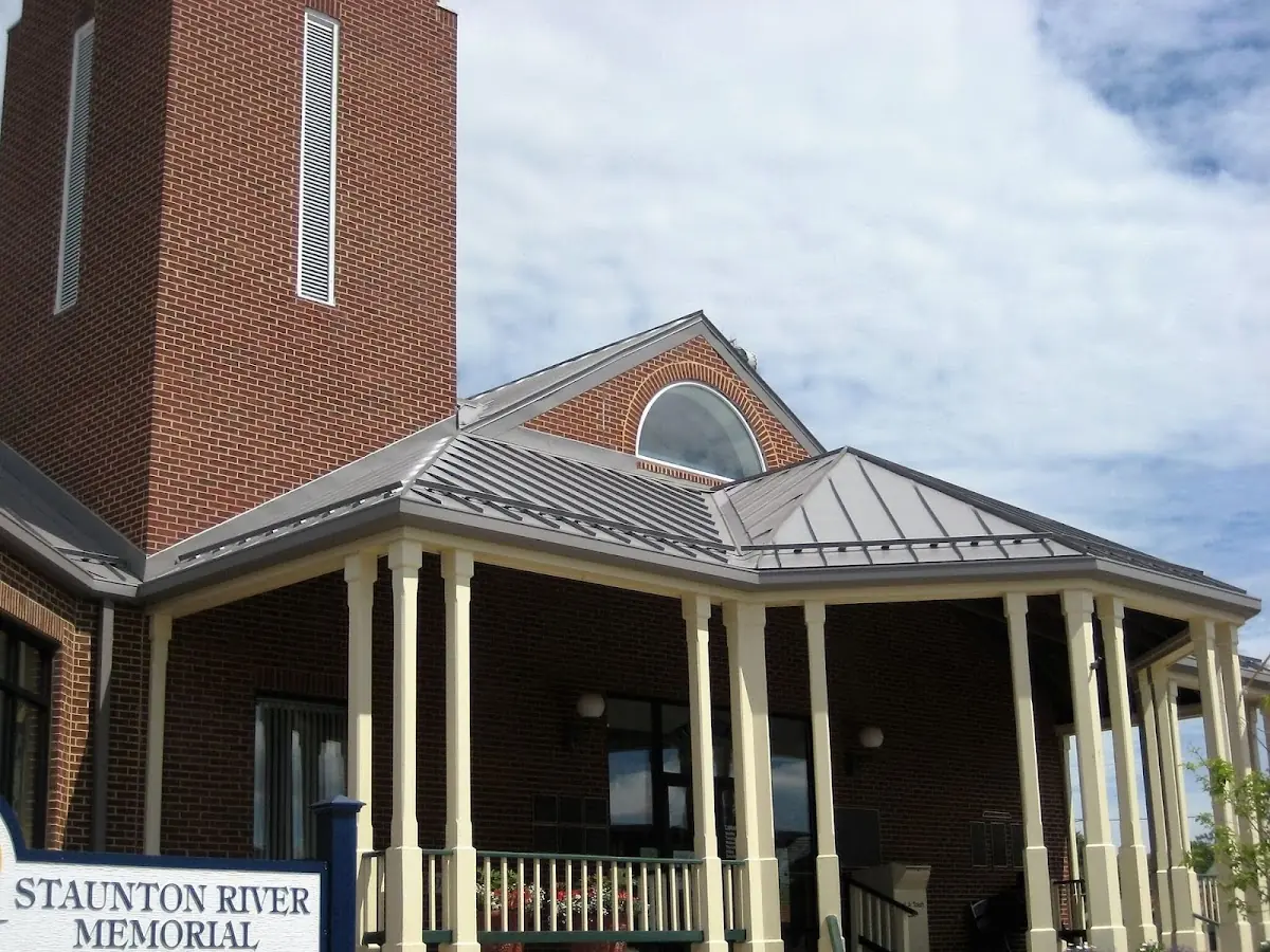 Skilled roofing craftsmen working on a residential roof in Clearfield